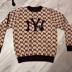 NY brown sweater